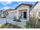 Charming home featuring a well-kept front yard, covered entrance, and an attached garage at 20778 Balsam Hill Rd, Land O Lakes, FL 34638