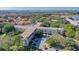Community aerial view highlighting the building's architectural features and proximity to lush landscaping at 2253 Norwegian Dr # 67, Clearwater, FL 33763