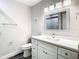 Updated bathroom boasts modern vanity, new fixtures, and ample lighting at 2253 Norwegian Dr # 67, Clearwater, FL 33763