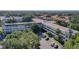Exterior shot of the building featuring well-maintained facade and mature landscaping at 2253 Norwegian Dr # 67, Clearwater, FL 33763