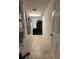 Utility room with washer, dryer, refrigerator and tile floor at 22941 Leafwood Ct, Land O Lakes, FL 34639