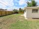 Spacious backyard featuring a new wooden privacy fence at 3094 Vernon Ter, Largo, FL 33770