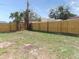 Spacious backyard featuring a new wooden privacy fence at 3094 Vernon Ter, Largo, FL 33770