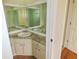 Inviting bathroom featuring a corner vanity with generous mirrors at 3094 Vernon Ter, Largo, FL 33770