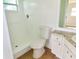 Bathroom featuring a walk-in shower, toilet, and vanity at 3094 Vernon Ter, Largo, FL 33770