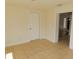 Neutral room with tile flooring, closet and doorway to another room at 3094 Vernon Ter, Largo, FL 33770