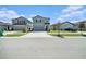 Attractive two-story home with a well-manicured lawn and inviting curb appeal at 35542 Buttonweed, Zephyrhills, FL 33541