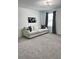 Bright and airy living room with a comfortable sofa and neutral decor, perfect for relaxing and entertaining at 35542 Buttonweed, Zephyrhills, FL 33541