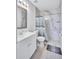 Updated bathroom with marble tiled shower featuring sleek finishes and modern fixtures at 4106 Waterside Island Ct, Tampa, FL 33617