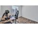 Comfortable bedroom with wood-look flooring, a window, and ample natural light at 4106 Waterside Island Ct, Tampa, FL 33617