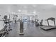 Well-equipped community gym with modern fitness machines, providing residents an optimal workout space at 4106 Waterside Island Ct, Tampa, FL 33617