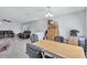Bright living area showcasing a large table and seating with connecting room at 4106 Waterside Island Ct, Tampa, FL 33617