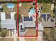 Aerial view of the property, displaying the backyard, solar panels, pool, firepit, and location relative to the neighborhood at 4346 10Th N Ave, St Petersburg, FL 33713