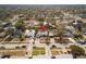 A high aerial view of the property in relation to the neighborhood and surrounded by lush trees at 4346 10Th N Ave, St Petersburg, FL 33713