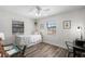 Bright bedroom features hard surface floors, ceiling fan, and bright windows at 4346 10Th N Ave, St Petersburg, FL 33713