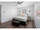 Bright bedroom featuring wood-look flooring and a ceiling fan at 4346 10Th N Ave, St Petersburg, FL 33713
