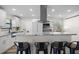 Well-lit kitchen featuring an eat-in bar, modern appliances, granite countertops and ample cabinetry at 4346 10Th N Ave, St Petersburg, FL 33713
