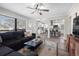 Open-concept living room with lots of sunlight looking to the connected kitchen at 4346 10Th N Ave, St Petersburg, FL 33713
