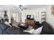 Open-concept living room offering seamless flow to kitchen and stylish furniture at 4346 10Th N Ave, St Petersburg, FL 33713