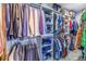 Organized walk-in closet featuring custom shelving and hanging space at 4514 W Beachway Dr, Tampa, FL 33609