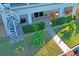 Aerial view of patio, spiral staircase and waterfront backyard with private dock at 5100 Cedarbrook, Hernando Beach, FL 34607