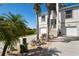 Charming two-story home with a two-car garage and tropical landscaping at 5100 Cedarbrook, Hernando Beach, FL 34607