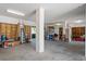 Garage featuring rolled door, shelves, and an assortment of storage items at 5100 Cedarbrook, Hernando Beach, FL 34607