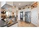 Modern kitchen boasts stainless steel appliances, including a refrigerator and built-in oven, paired with white cabinetry at 5100 Cedarbrook, Hernando Beach, FL 34607