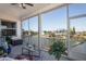 Relaxing screened-in lanai with comfortable seating and a picturesque waterfront view at 5100 Cedarbrook, Hernando Beach, FL 34607