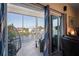 Screened-in lanai overlooking a serene waterfront view, perfect for outdoor relaxation at 5100 Cedarbrook, Hernando Beach, FL 34607