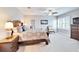 Spacious bedroom with neutral walls, ceiling fan, and coordinated furniture, creating a serene atmosphere at 5115 Abisher Wood Ln, Brandon, FL 33511