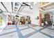 Spacious garage with epoxy flooring, storage solutions, and ample room for vehicles and equipment at 5115 Abisher Wood Ln, Brandon, FL 33511