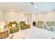 Spacious living room featuring four comfortable recliners on a soft carpet with plenty of natural light at 5115 Abisher Wood Ln, Brandon, FL 33511