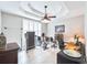 Bright office featuring a ceiling fan, tile floors, and lots of space to work at 5115 Abisher Wood Ln, Brandon, FL 33511