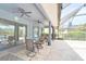 Covered outdoor patio perfect for alfresco dining at 5115 Abisher Wood Ln, Brandon, FL 33511