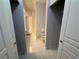 Neutral bathroom with tile flooring, toilet, vanity, and closet at 5125 Palm Springs Blvd # 1203, Tampa, FL 33647