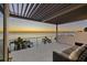 Balcony with outdoor furniture offers stunning sunset and water views at 5128 W Longfellow Ave, Tampa, FL 33629