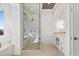 Modern bathroom with a glass-enclosed shower and vanity at 5128 W Longfellow Ave, Tampa, FL 33629