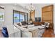Beautiful living room showcasing water views, modern lighting and bright decor at 5128 W Longfellow Ave, Tampa, FL 33629