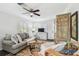Cozy living room featuring hardwood floors and stylish furnishings at 6202 Tennessee Ave, New Port Richey, FL 34653