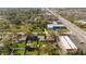 Aerial view of property, highlighting the neighborhood layout, landscaping, and proximity to nearby roads at 6585 86Th N Ave, Pinellas Park, FL 33782