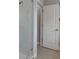 Modern bathroom with a glass shower and a white door at 6615 S Manhattan Ave # 2, Tampa, FL 33616
