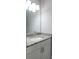Close-up of a bathroom vanity with granite countertop and modern fixtures at 6615 S Manhattan Ave # 2, Tampa, FL 33616