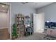 This office space features ample book storage and is brightly illuminated by a ceiling fan with light fixture at 6615 S Manhattan Ave # 2, Tampa, FL 33616