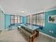 Inviting dining room with a large table perfect for entertaining at 7305 Windsor St, Hudson, FL 34667