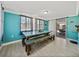 Bright dining room with large table and access to outdoor patio at 7305 Windsor St, Hudson, FL 34667