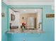 A pass through from kitchen to the dining room at 7305 Windsor St, Hudson, FL 34667