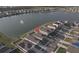 Aerial view of home, showcasing the neighborhood pond and location at 7771 Davie Ray Dr, Zephyrhills, FL 33540