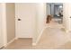 Hallway with tile floor at 7771 Davie Ray Dr, Zephyrhills, FL 33540