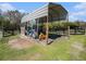 Barn with a tractor and farm equipment inside, providing space for storage and protection from the elements at 7843 Shoupe Rd, Plant City, FL 33565